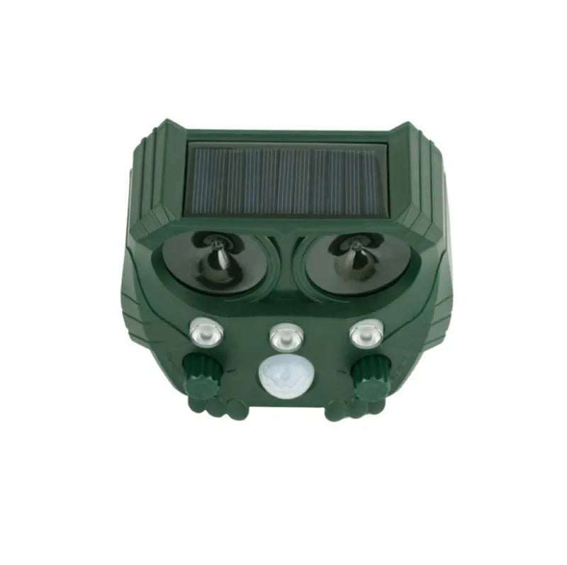 Green solar-powered ultrasonic animal repeller with LED strobe lights for outdoor dog and pest control