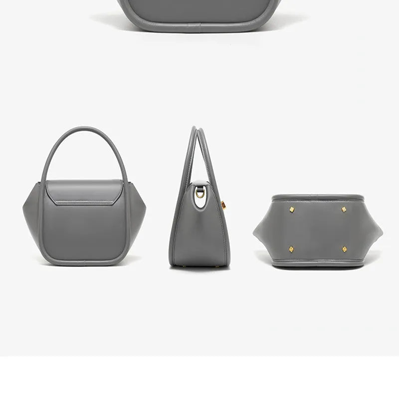 Genuine cow leather wing-shaped tote bag with buckle detail and cross-body shoulder strap