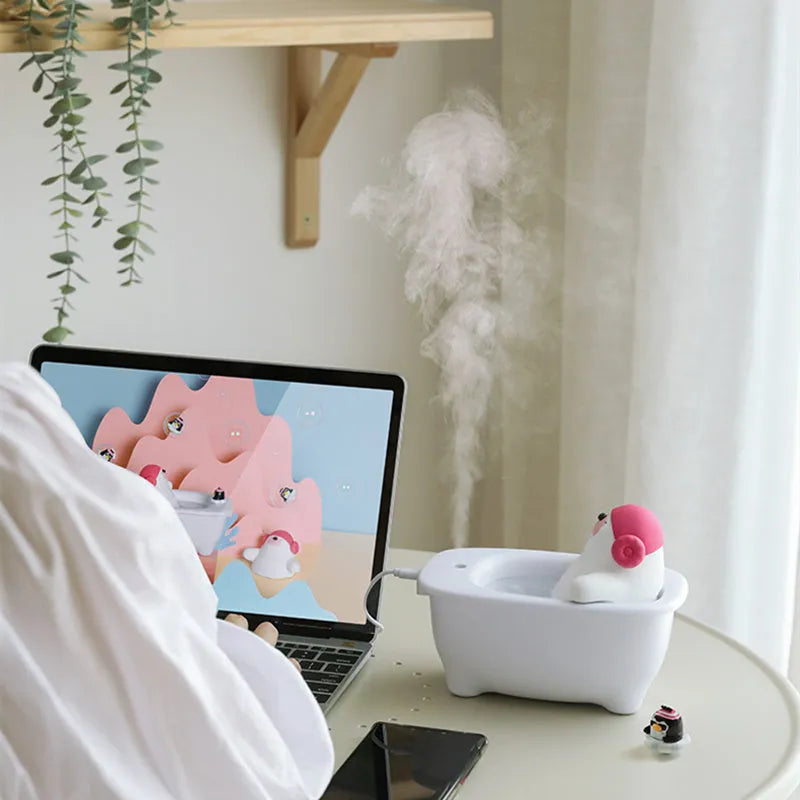 White USB air humidifier with transparent 550ml water tank and compact desktop design