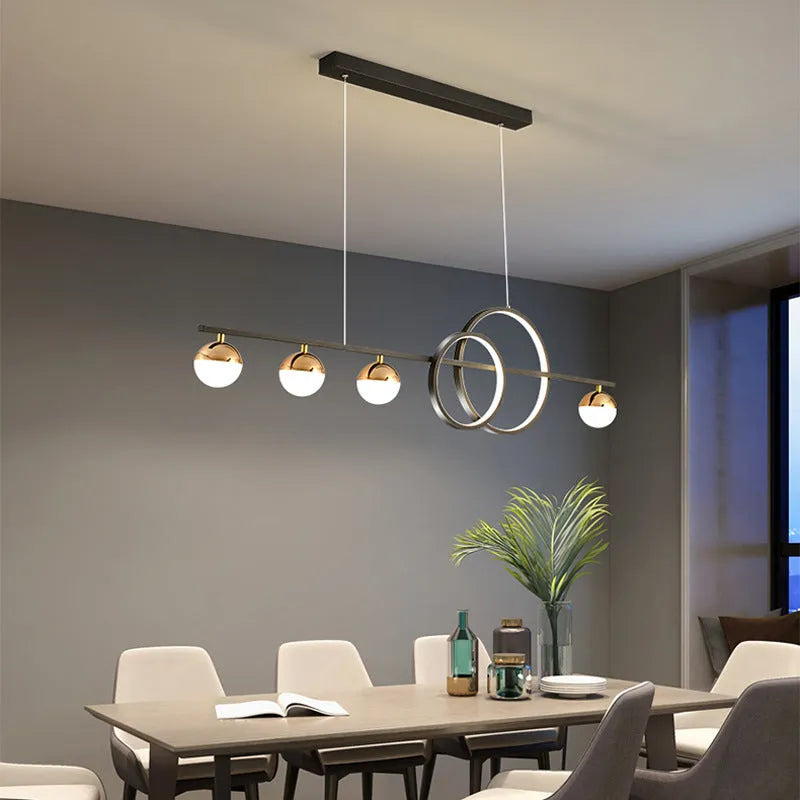 Rectangular aluminium ceiling light in black or gold finish with remote control for white and three-colour dimming.