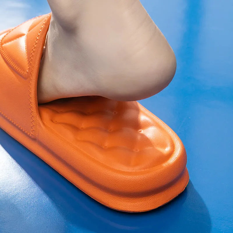 A pair of thick-soled EVA foam bath sandals in a chosen colour, showing the non-slip sole pattern.
