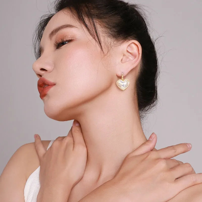 Gold colour alloy metal ear clips with summer love design theme for women's fashion