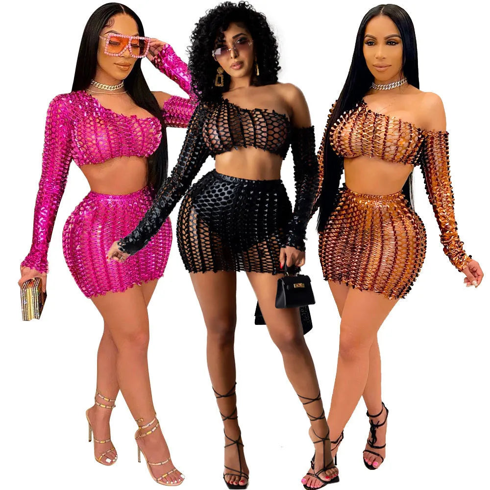 Women's black hollow-out net two-piece dress set with sleeveless top and matching short skirt