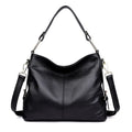 Genuine leather vertical square crossbody bag in black colour with visible stitching and multiple compartments.