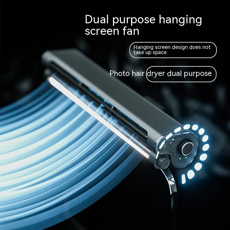 Black USB bladeless fan clipped to laptop screen with integrated lighting lamp and three-speed button control