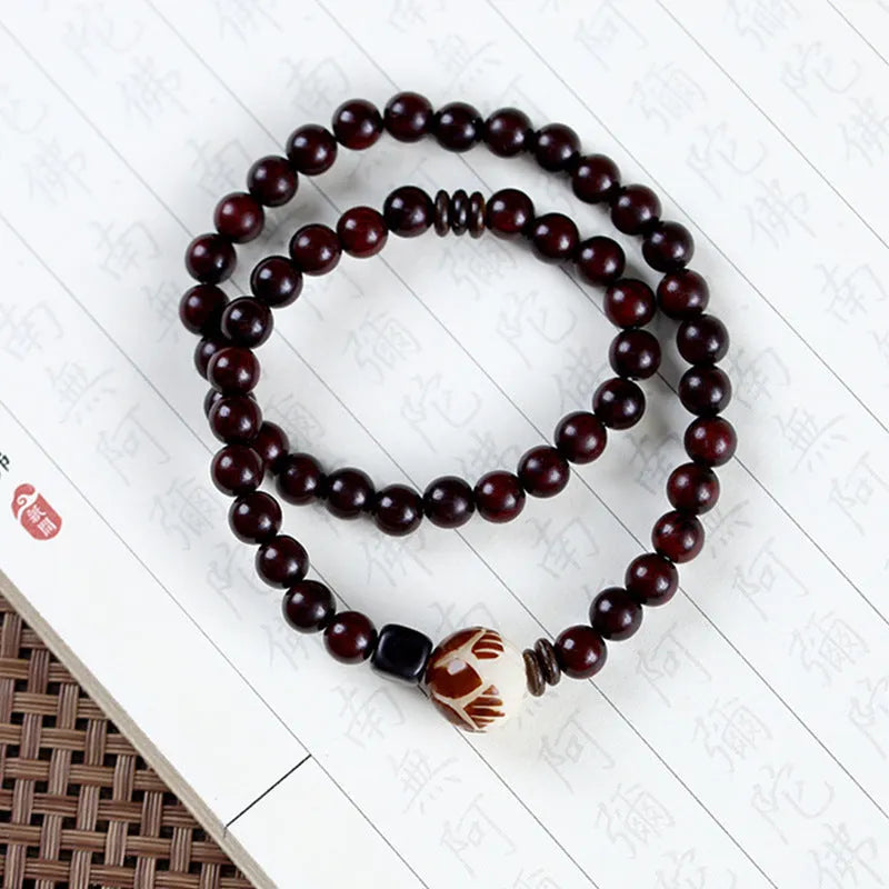 Natural rosewood bracelet with knitted texture and 10mm floral centrepiece in unisex retro design
