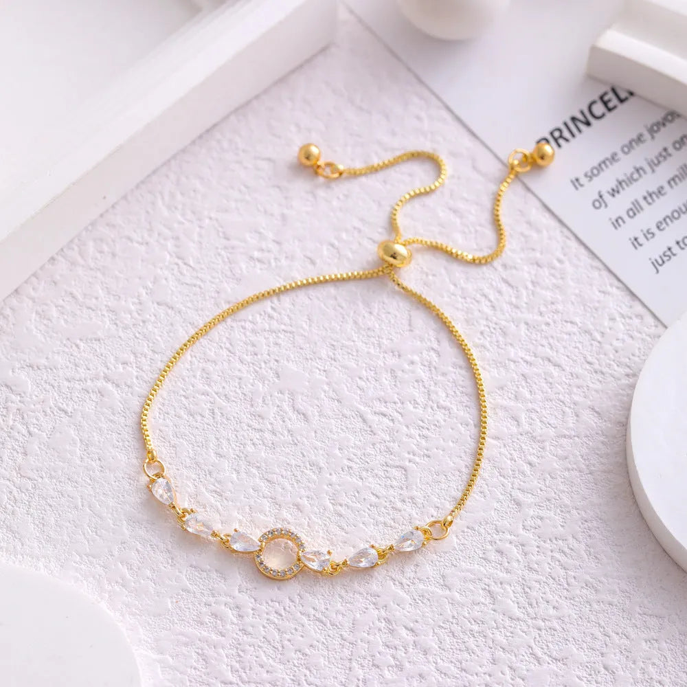 Copper micro inlaid zircon simple circle bracelet YS047 gold on white background