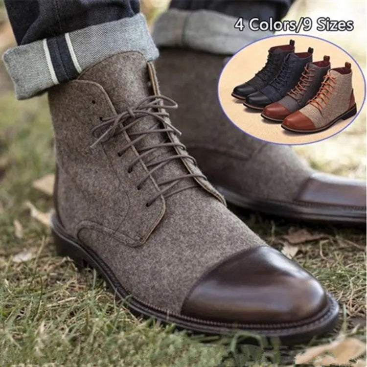 Men's black leather boots with metal belt buckle details and a rubber sole.