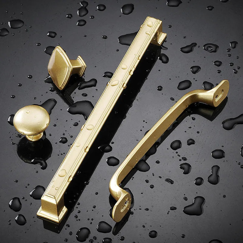 Gold aluminium T-shaped cabinet handle showing three hole distance options: 96mm, 128mm and 192mm