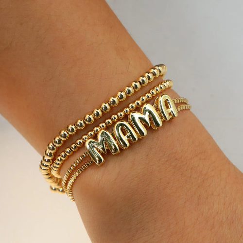 18k brass smooth surface bubble letter bracelet with pendant in gold colour on copper alloy