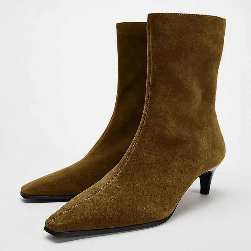 Brown women's square toe ankle boots with a side zip and a stiletto kitten heel on a waterproof platform sole.