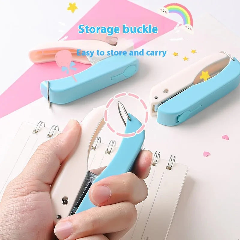 Small manual hand punch for embossing love, star, 4mm and 6mm round shapes on paper.