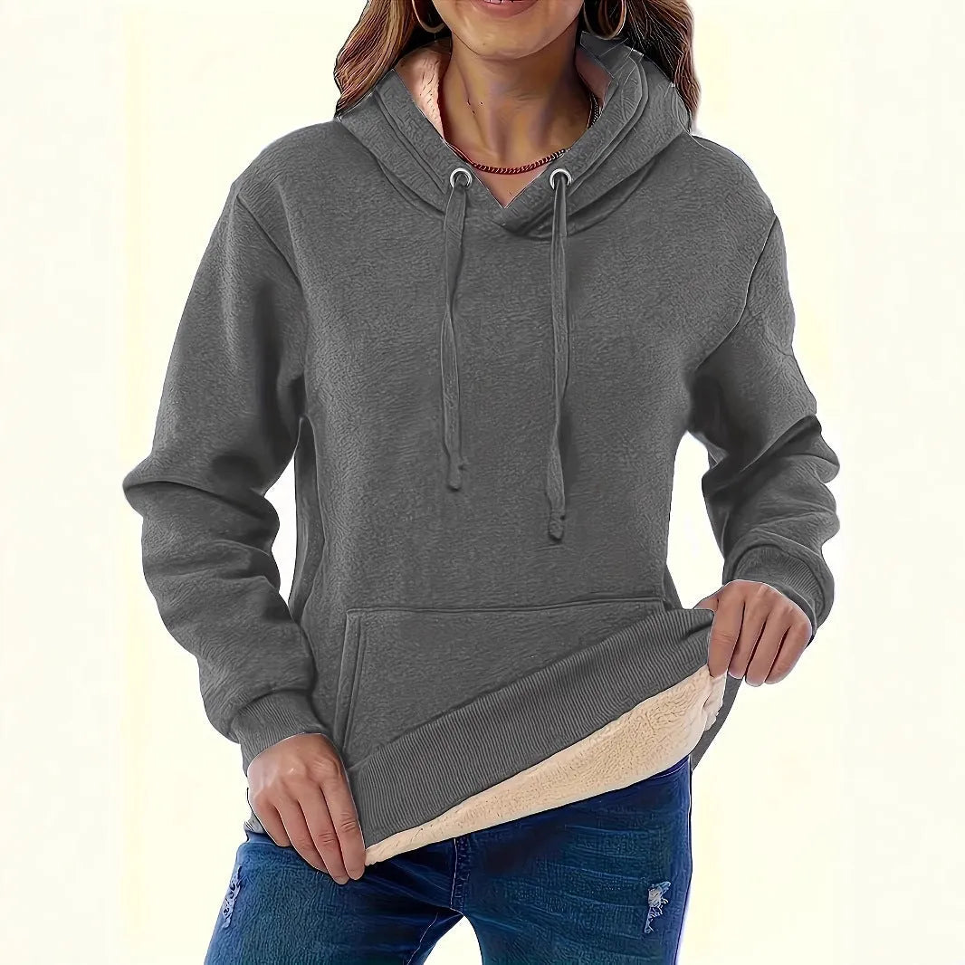 Women's loose fit hooded sweater with front pockets in thick polyester fleece