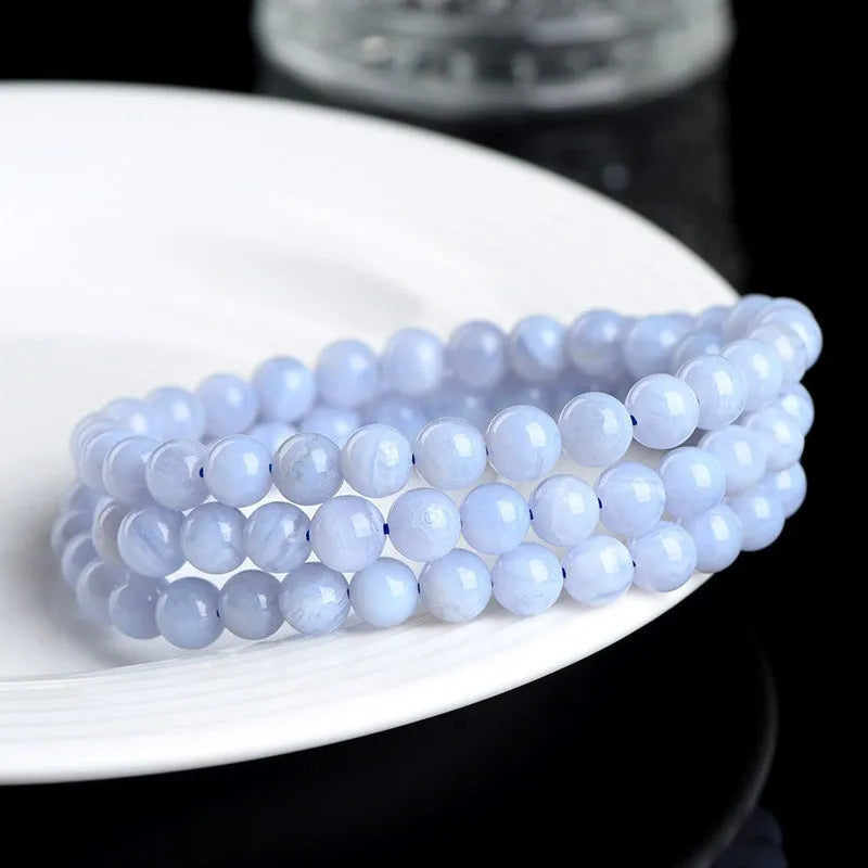 Blue agate bracelet with natural striped patterns, 6-6.8mm scattered beads featuring Ruyi design elements