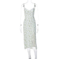 Blue lace flowers print long dress on a mannequin, showing side slit and suspender straps.