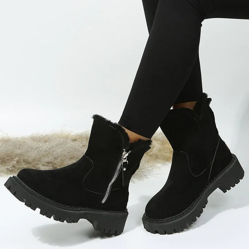 Women's black high-top snow boots with side zipper, plush lining, and non-slip rubber sole