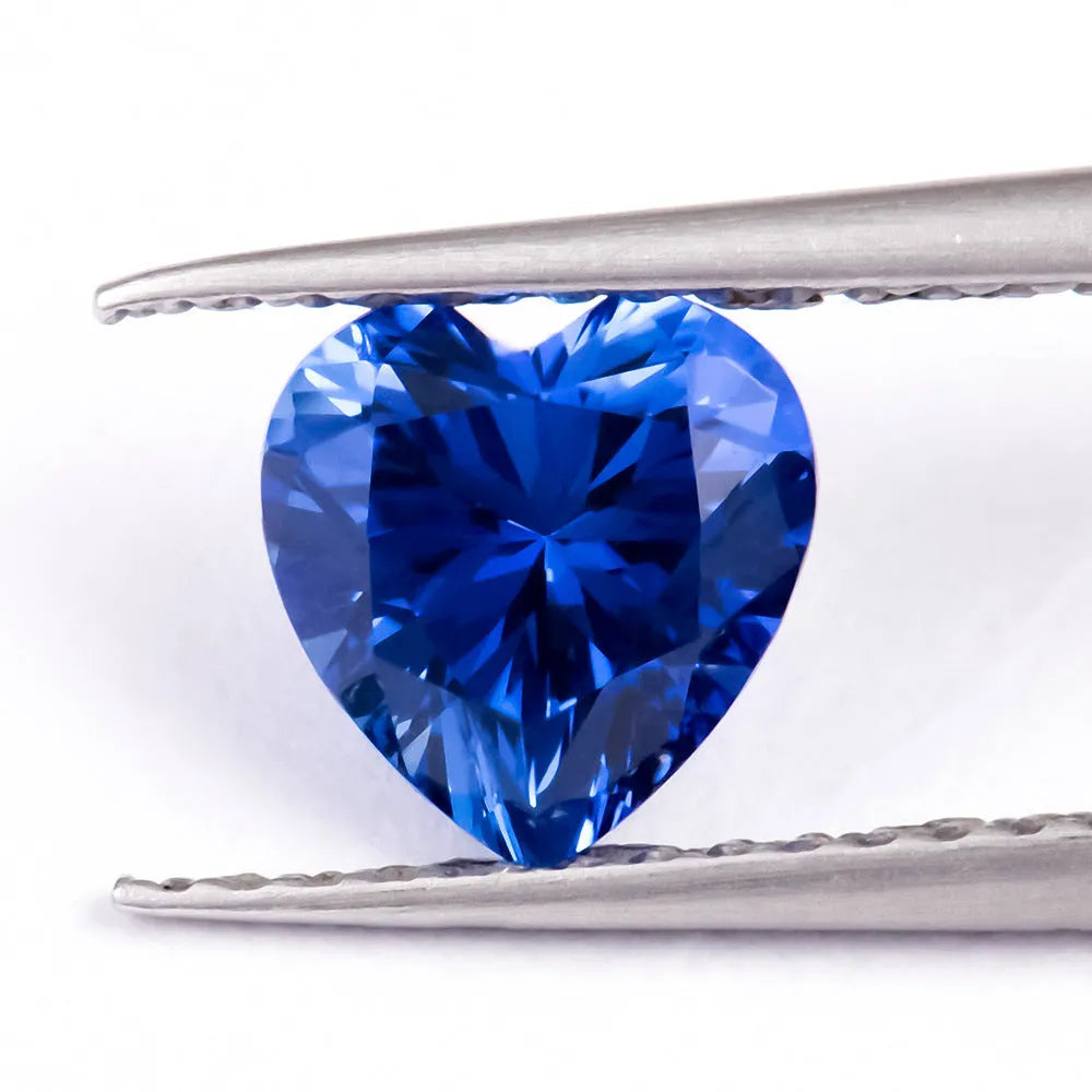 Royal blue heart-shaped tiara cut cubic zirconia loose gemstone on white background
