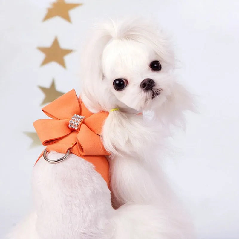 Dog wearing pink microfiber chest strap with decorative bowknot design