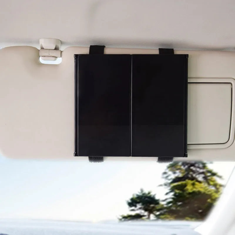 Silver car folding makeup mirror shown closed and open with dimensions 15.5x14cm and 30.5x14cm
