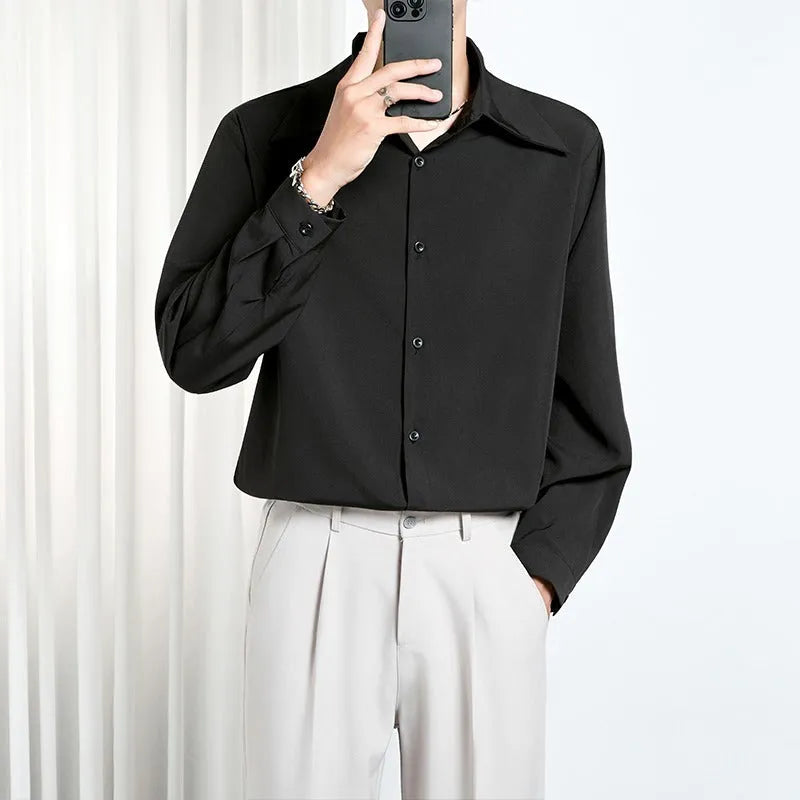 Men's loose non-iron polyester shirt in black and white, front view, with casual styling