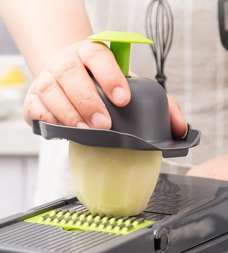 Multifunctional Vegetable Cutter with 7 blades, body in wheat straw material, stainless steel blades, 31.8x11.5x11.5 cm, on kitchen counter