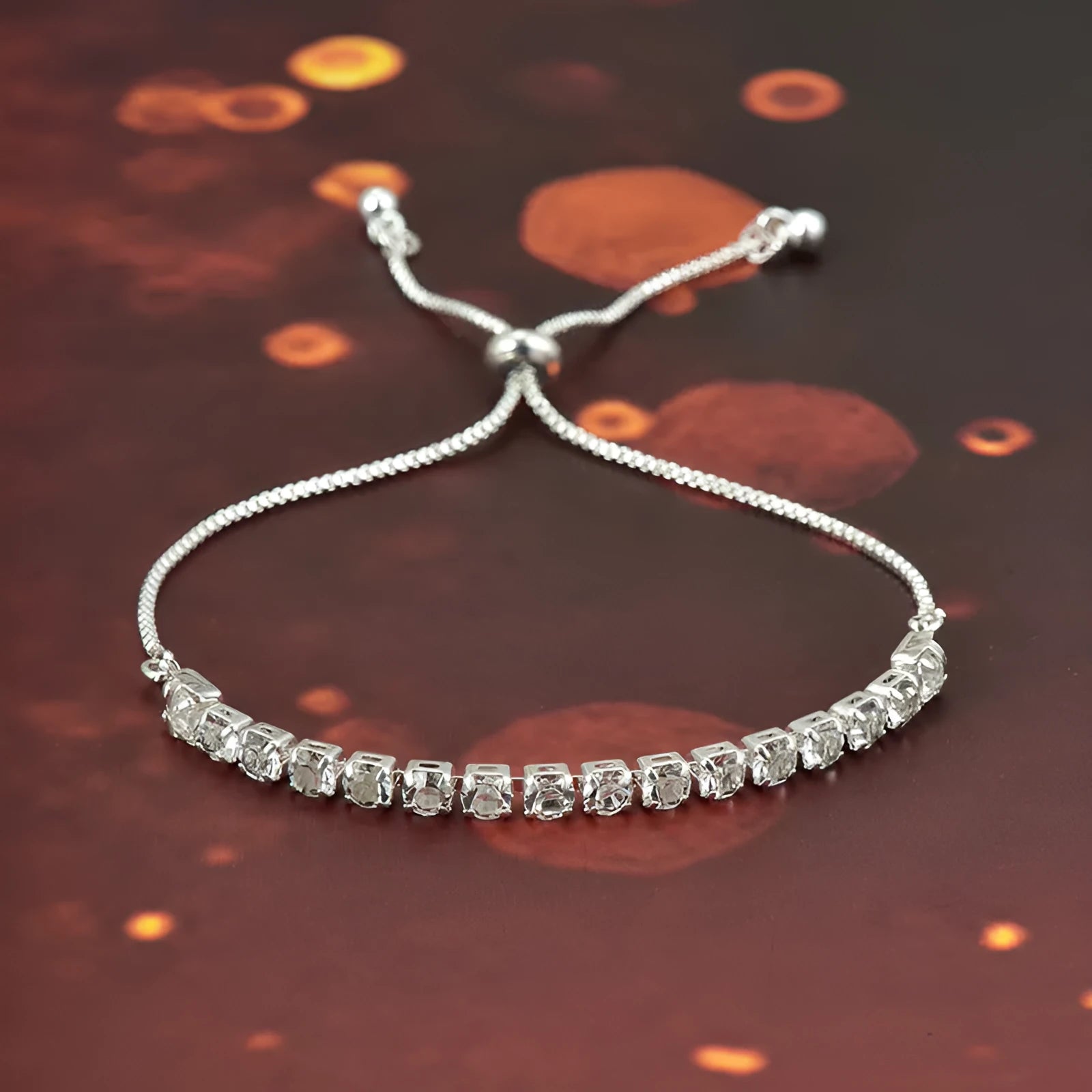 Micro-studded claw chain simple bracelet in metallic finish with round geometric studs on unisex wrist