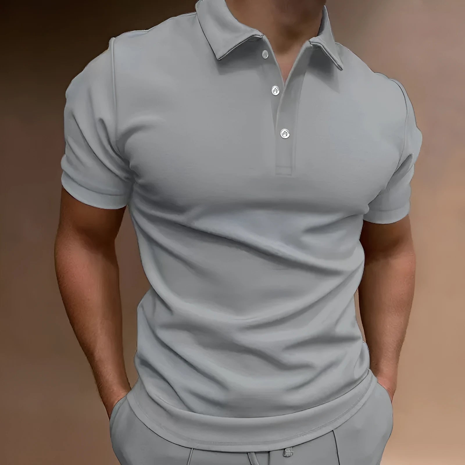 Men's loose fit cotton blend button t-shirt in grey, shown on a hanger.