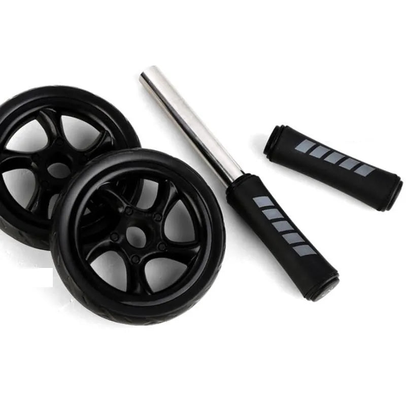 Black silent two-wheel abdominal roller with foam handles on a white background