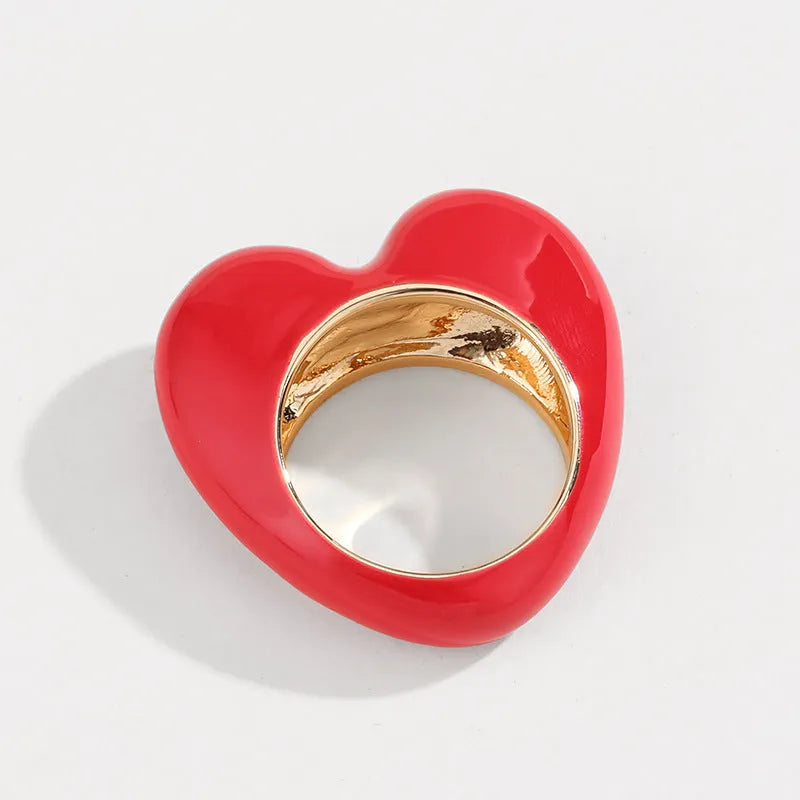 Heart-shaped zinc alloy ring with raised three-dimensional enamel colour design in love theme.