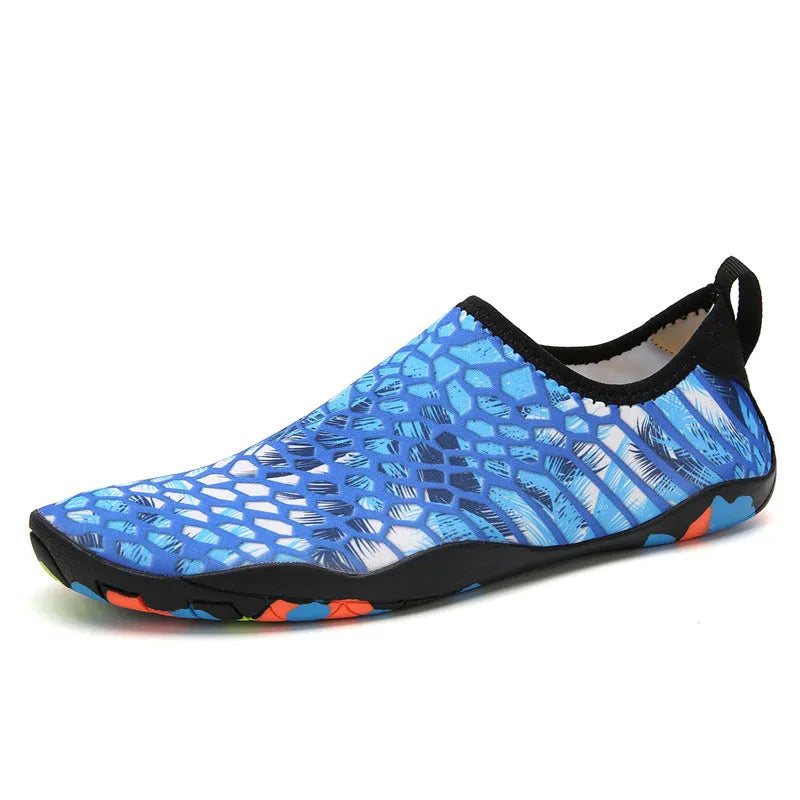 Men's and women's beach wading shoes in blue, with Lycra upper and EVA midsole, on a sandy background.