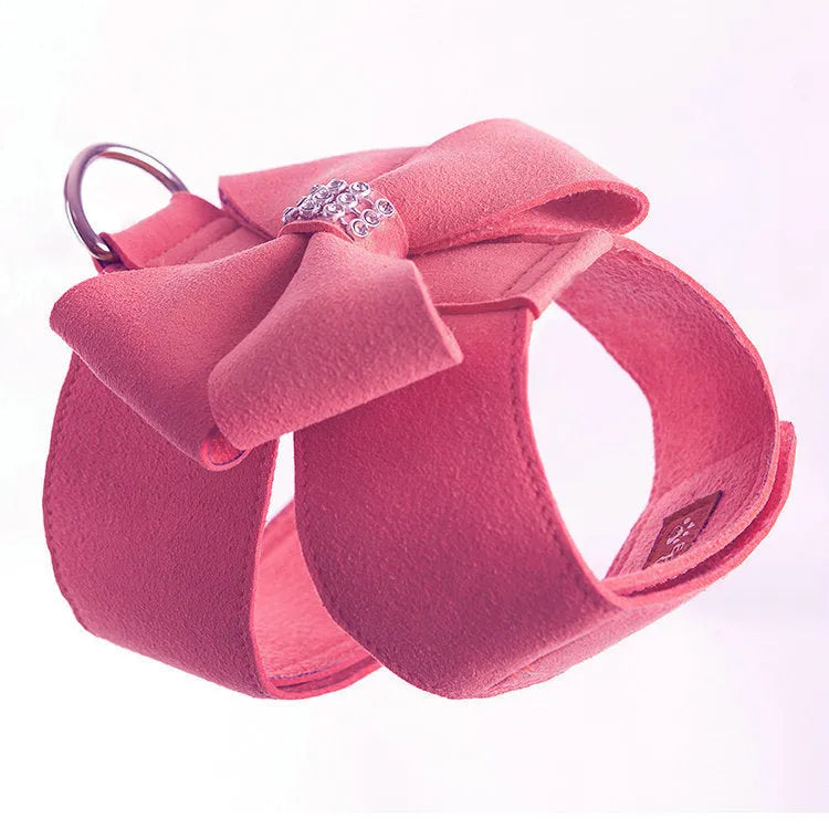 Dog wearing pink microfiber chest strap with decorative bowknot design