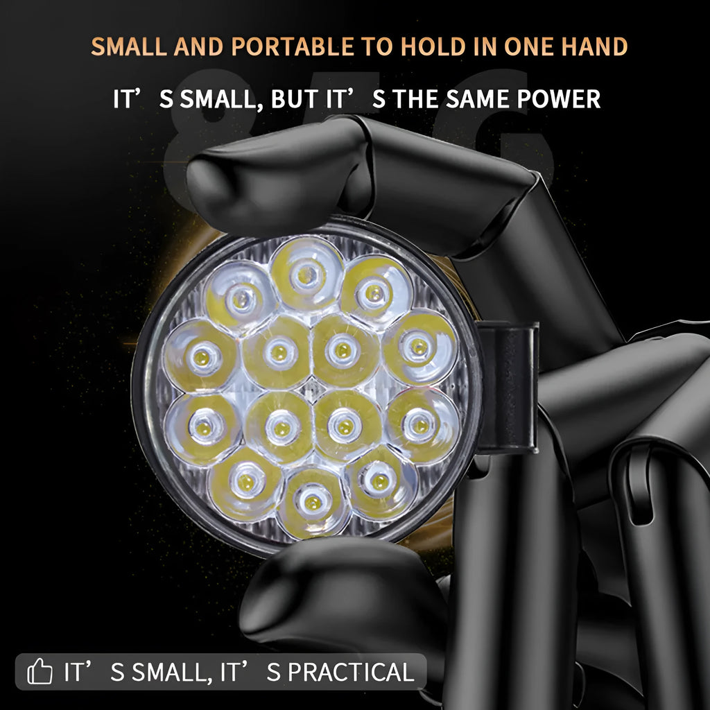 White aluminium LED work light with a round design, suitable for mounting on a vehicle.