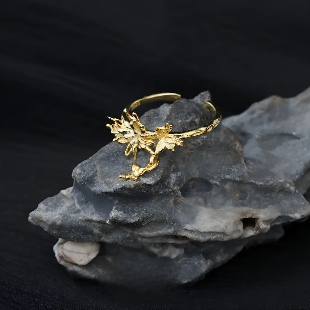 Adjustable silver ring with wild butterfly design in electroplated gold colour