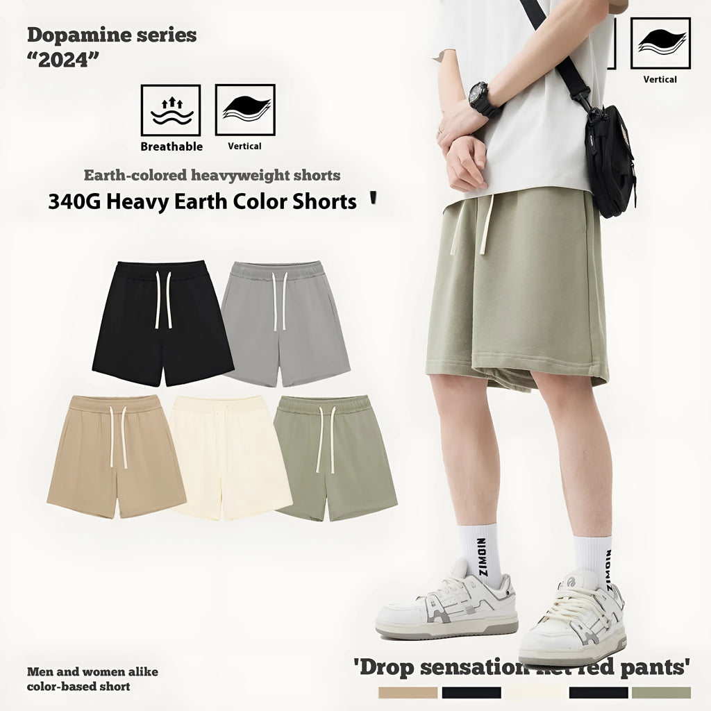 A pair of loose-fit cotton denim shorts for children in a charcoal gray colour