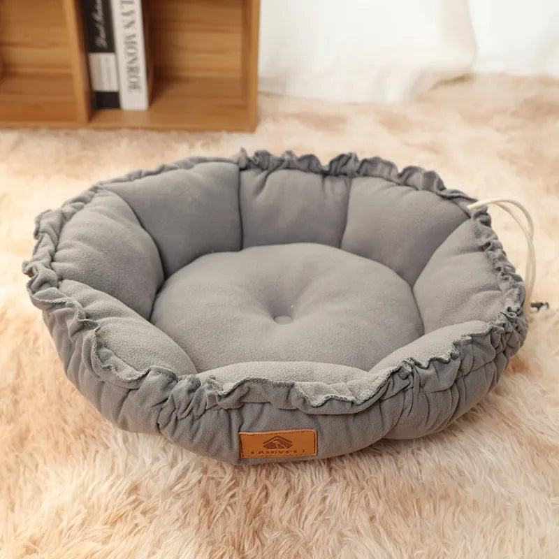Grey and green reversible donut cat bed for indoor pets in small, medium, large sizes.