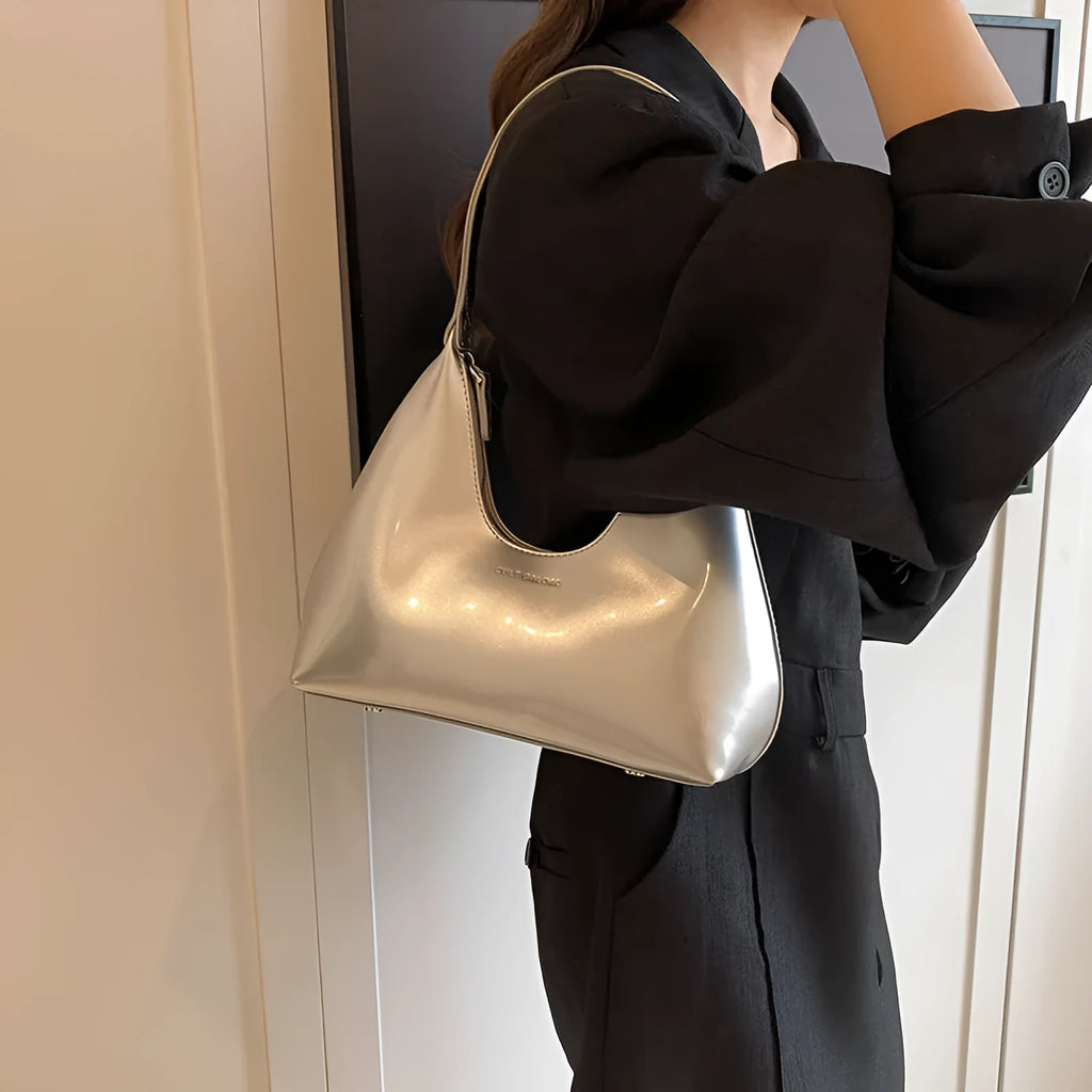 French style PU leather shoulder bag with sewing line detail and dumpling shape, available in multiple colours
