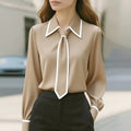 Women's solid colour long sleeve satin polyester shirt in black, with pullover style and regular sleeve