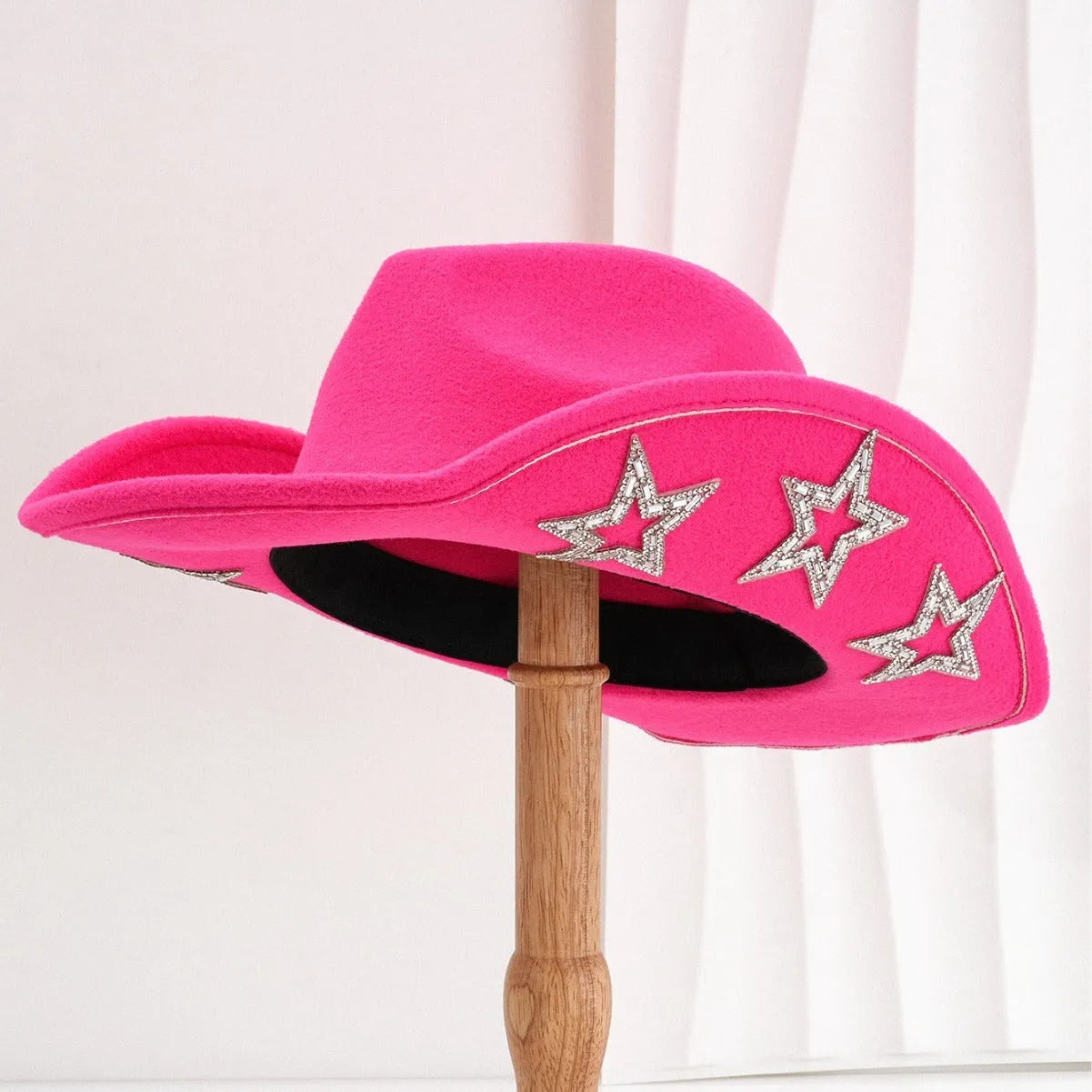 Brown polyester Western denim top hat with a conical crown and a silver hexagonal star decoration on the front.