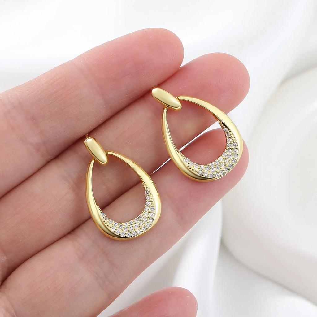 Women's yellow gold geometric drop-shaped ring earrings with copper construction and electroplated finish