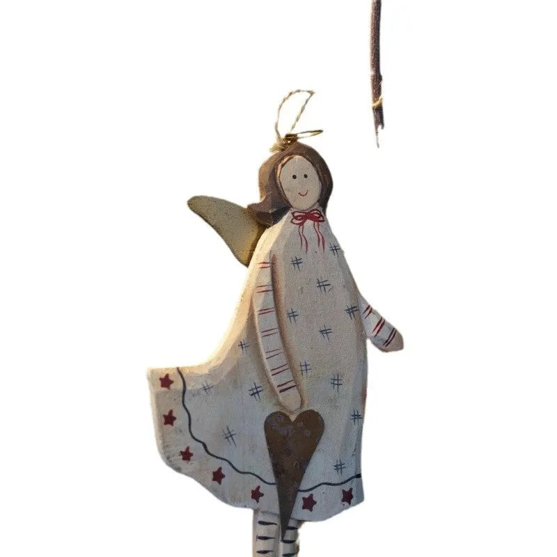 Hand-painted carved wooden door pendant with a country style heart design on a white background.
