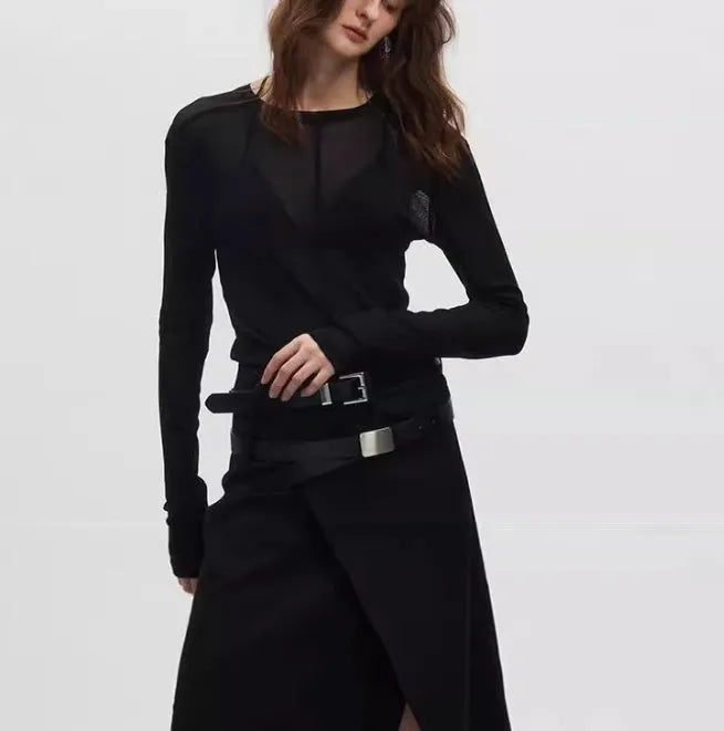 Black mesh slim-fit long sleeve PU pullover top with round neck on a model