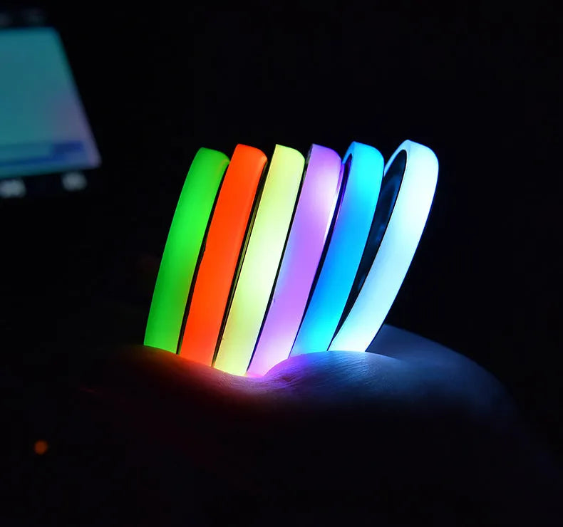 LED light-up car cup holder coaster showing seven colour options with solar panel and USB charging