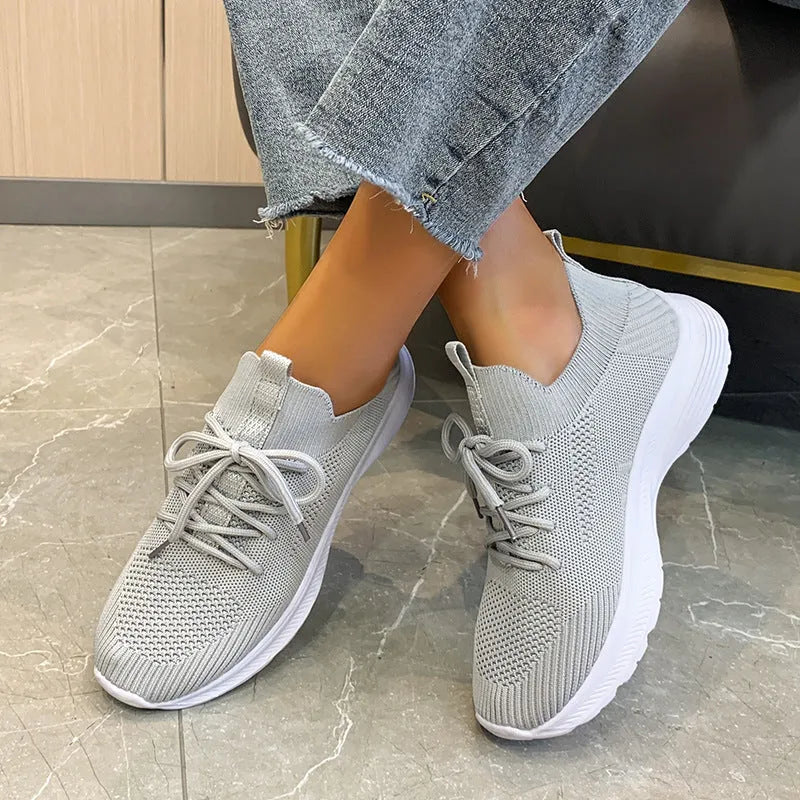 Women's breathable mesh running shoes in three colour options with flyknit upper and rubber sole