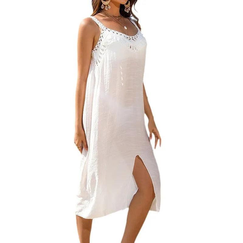 White crochet suspender beach dress with hollow weave detail and bottom slit on adult female model