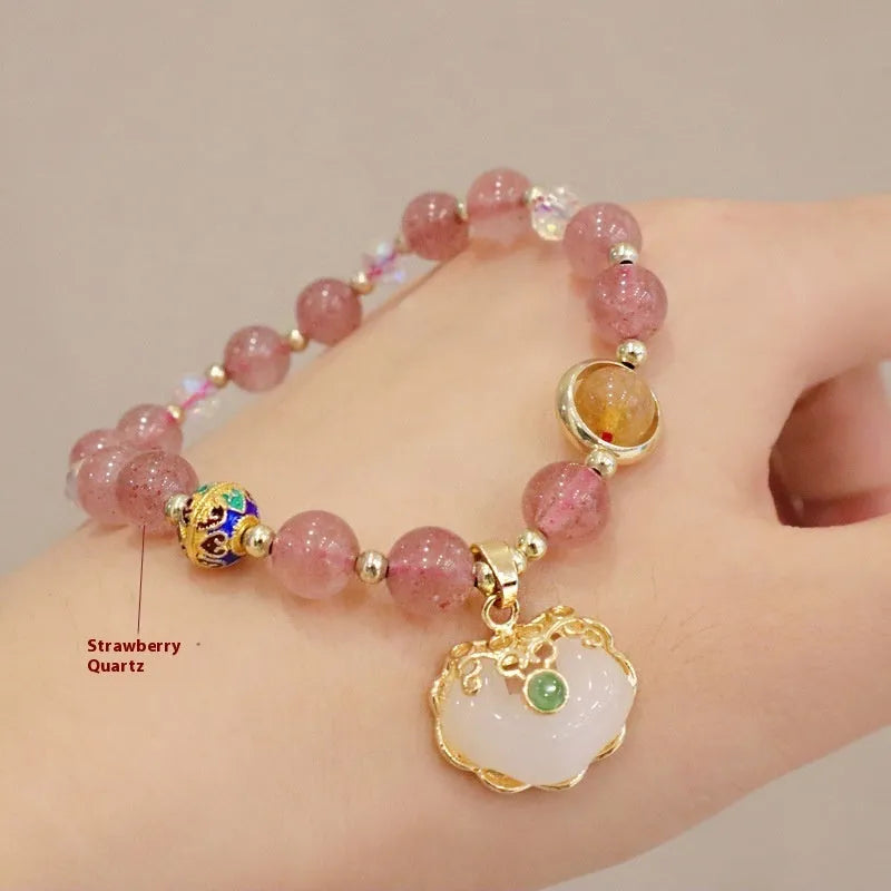 Geometric ethnic bracelet with strawberry quartz stones and metal decoration