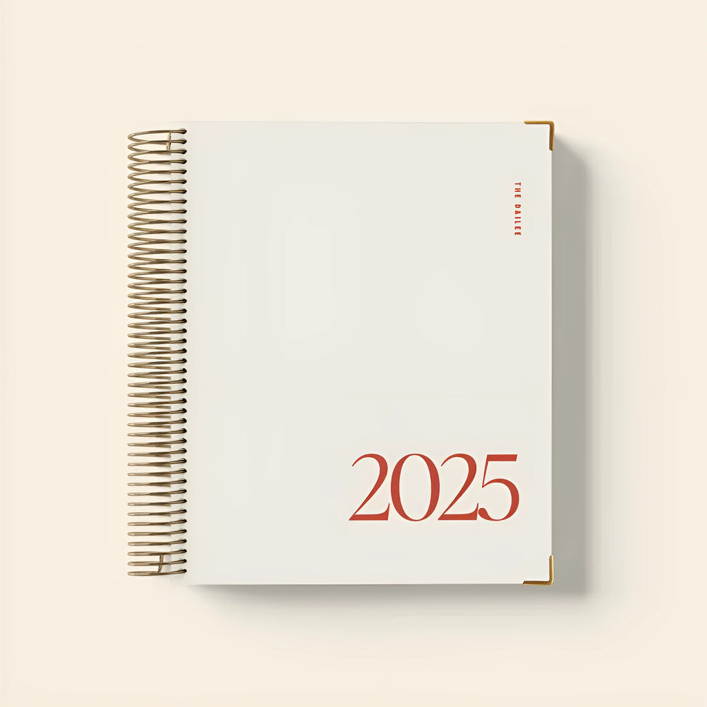 Cherry Red daily schedule coil notebook with spiral binding open to show interior pages