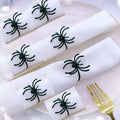 Set of six black alloy spider napkin rings with electrophoresis finish for Halloween table decoration