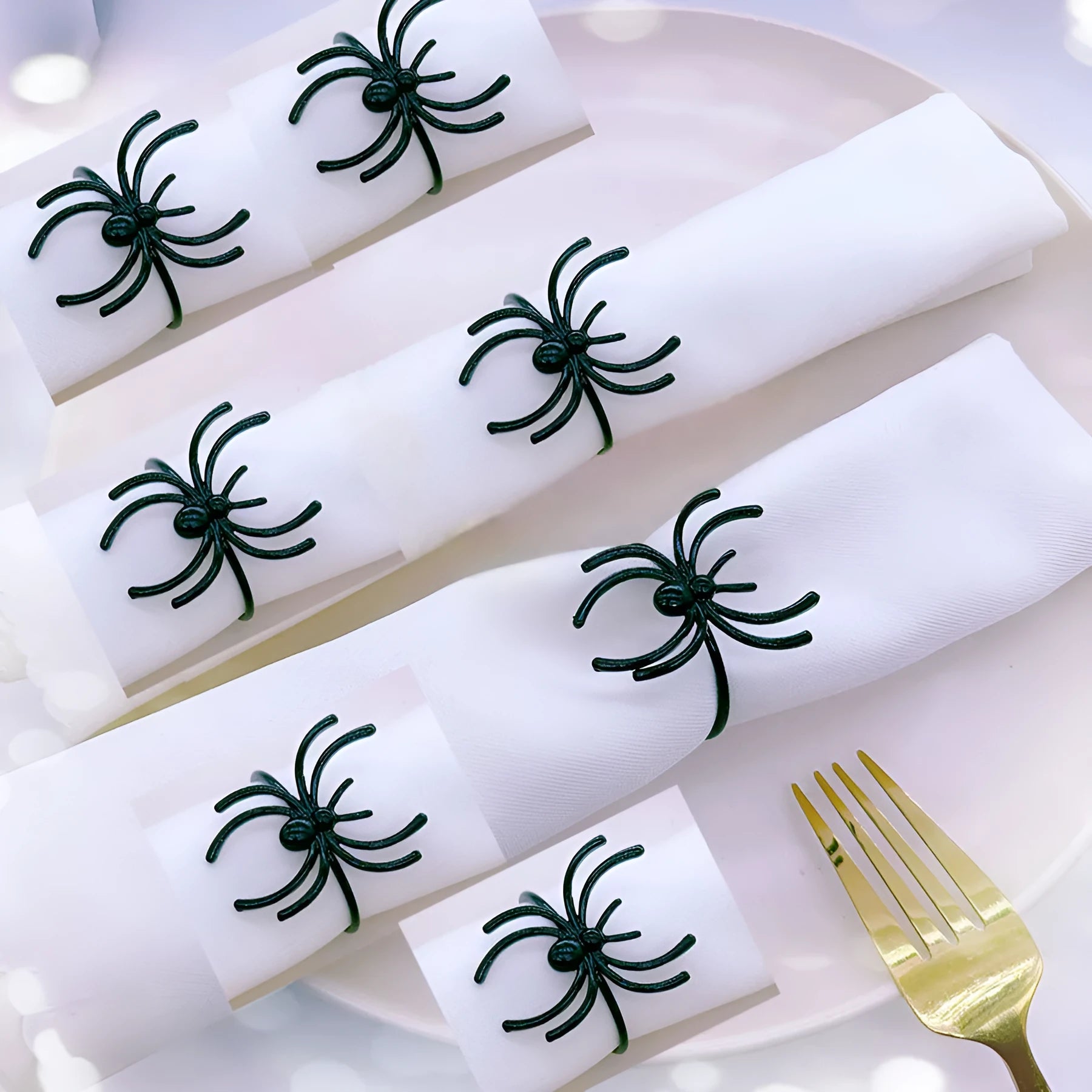 Set of six black alloy spider napkin rings with electrophoresis finish for Halloween table decoration