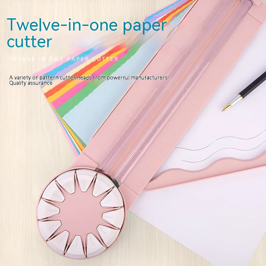 Pink and black 12-in-1 multifunctional plastic paper cutter with dotted guides on a cutting mat.