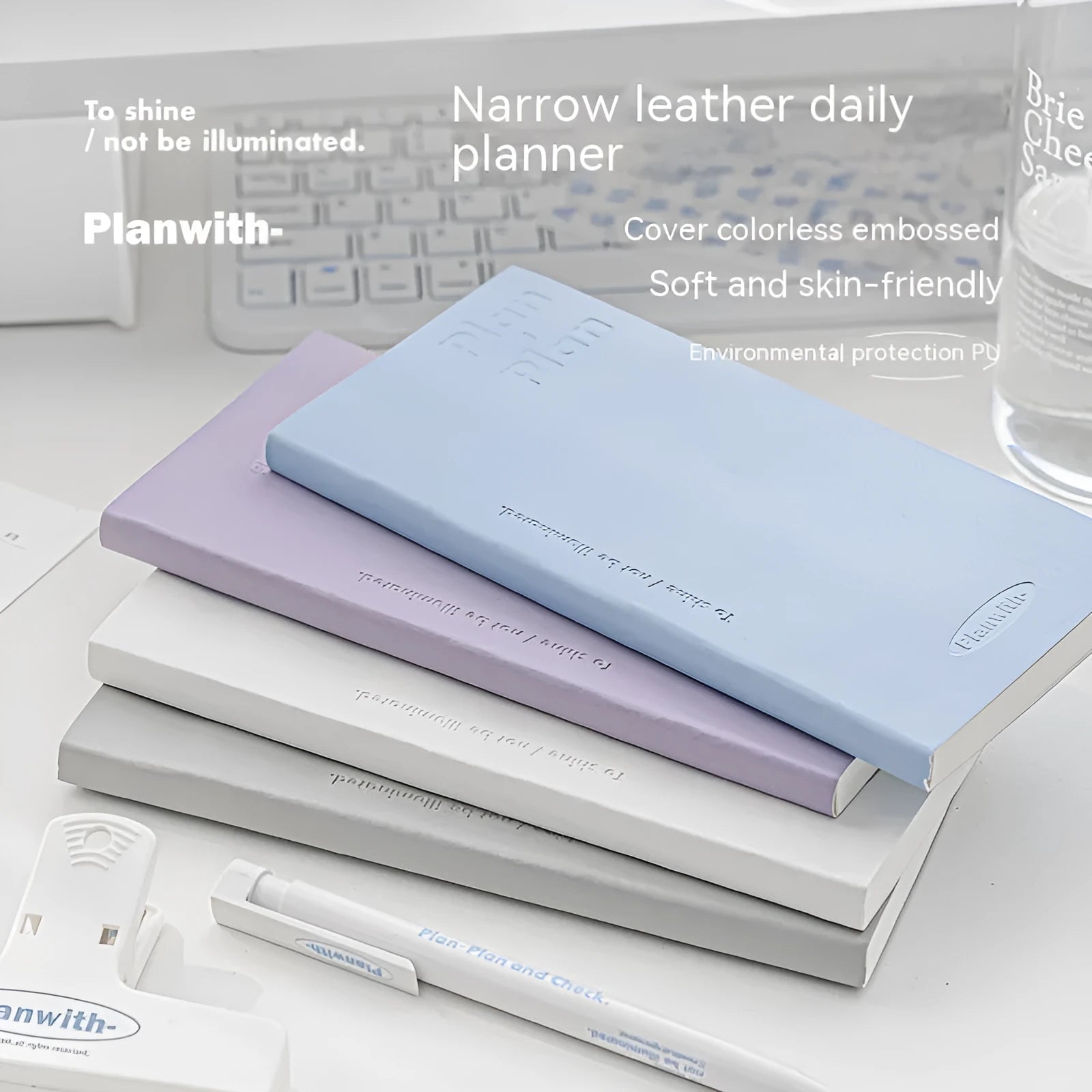 Embossed simple visual daily meter book in blue, showing prefect binding and white paper interior.